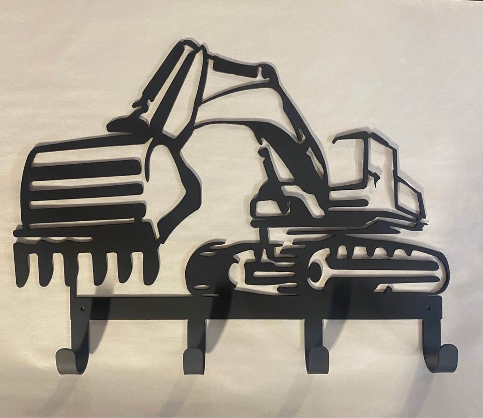 Excavator key/hat rack